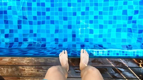 Man jump into swim pool Stock Footage 106449715
