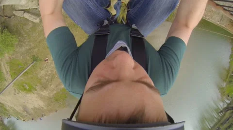 Man jumping backwards straight down Stock Footage 47817657