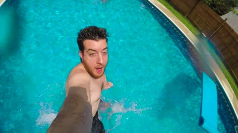 Man Jumping Into Backyard Pool Stock-Footage 61628388
