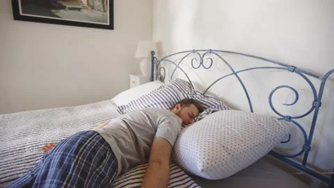 Man Jumping in Bed Resting Relaxing Sleeping Bed Day Time Mental Health Stock-Footage 195287490
