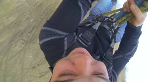 Man jumping off a bridge backwards Stock Footage 36553066