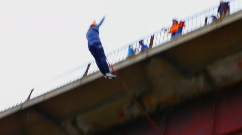 Man jumping from the bridge backwards Stock Footage 49922418