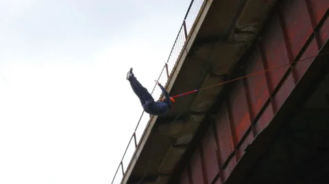 Man jumping from the bridge caved in headfirst Stock Footage 49922679