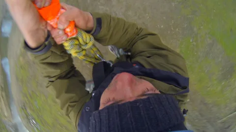 Man jumping off a bridge with the coup Stock Footage 34010385