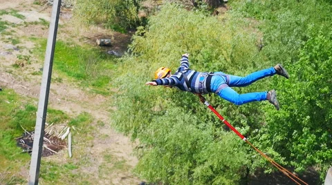 A man jumping from the bridge facing forward Stock Footage 50755760