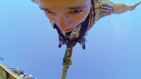 Man jumping from the bridge facing forward as arrow Stock Footage 52430146