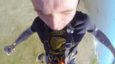 A man jumping from the bridge facing forward sharply Stock Footage 52430350