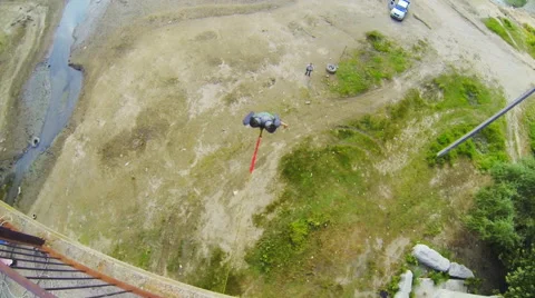 A man jumping from the bridge facing forward good rebounding Stock Footage 53349385