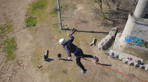 A man jumping from the bridge facing forward Stock Footage 68347124