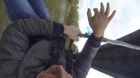 Man jumping off a bridge Stock Footage 32837850