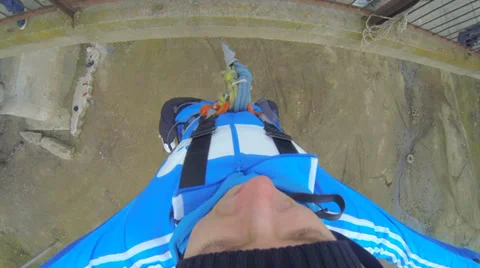 Man jumping off a bridge into the front line Stock Footage 36552868
