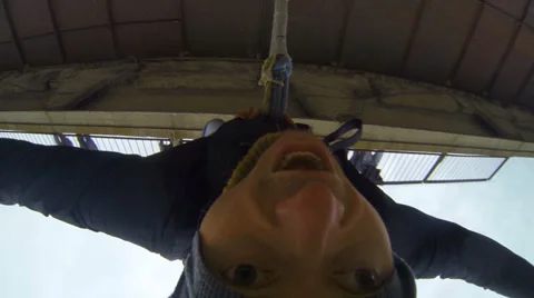 Man jumping off a bridge headfirst Stock Footage 37048339