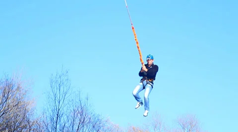 A man jumping off a bridge - jump shooting is conducted from a distance Stock Footage 33841557