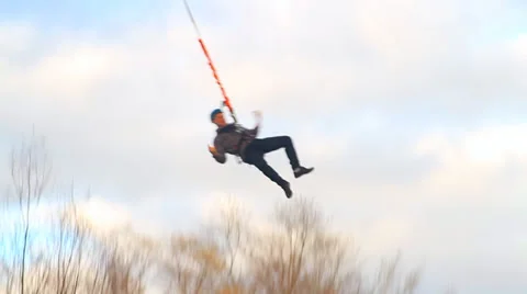 A man jumping off a bridge - jump shooting is conducted from a distance Stock Footage 33841716