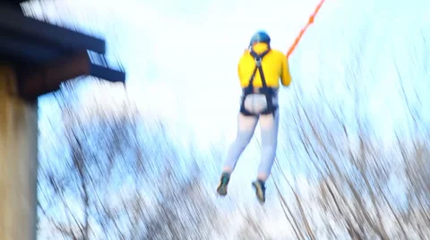 A man jumping off a bridge - jump shooting is conducted from a distance Stock Footage 33841741