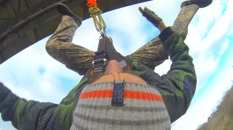 A man jumping off a bridge Shooting is the first person camera Gopro Hero 3 Stock Footage 33841032