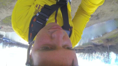 A man jumping off a bridge Shooting is the first person camera Gopro Hero 3 Stock Footage 33841265