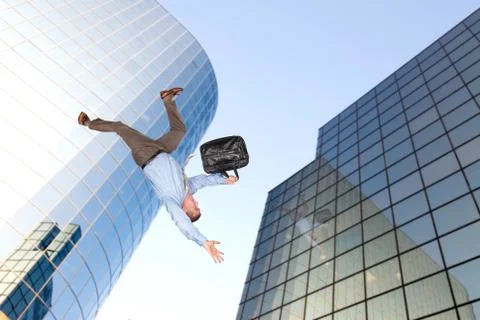 Man jumping off building Stock Photos