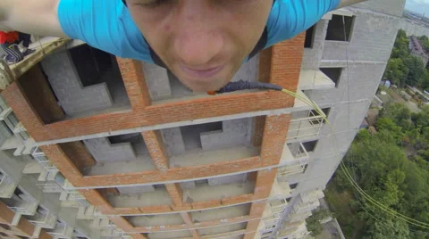 Man jumping facing forward with his hands apart Stock Footage 48367770