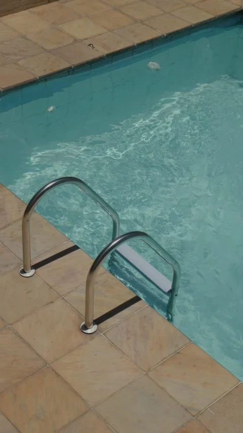 A man jumping in a pool. Stock Footage 346380623