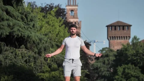 Man jumping with rope Stock Footage 132779991