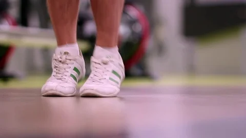 A man jumping rope in the gym Stock Footage 83129059