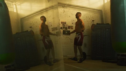 Man jumping rope inside a boxing studio Stock Footage 100036227