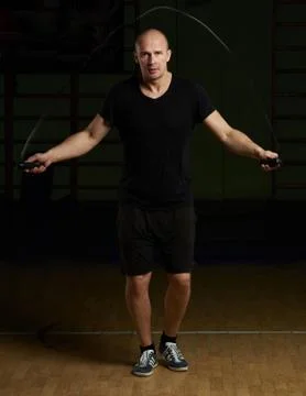 Man jumping with rope Stock Photos