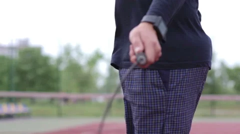 Man jumping rope with smart watches Stock Footage 63662893