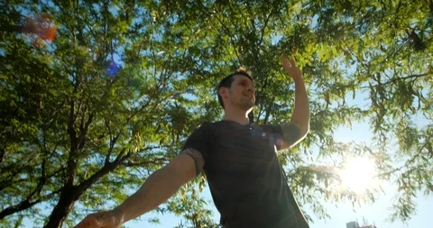 Man Jumping On Rope When Training For Sport On Trickline Stock Footage 111233546