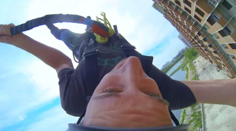 Man jumping sharply down flying floors Stock Footage 38190827