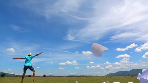A man jumping slow motion and cloud sky background. Stock Footage 108777445