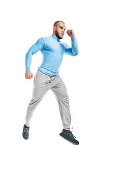 Man jumping at studio Stock Photos