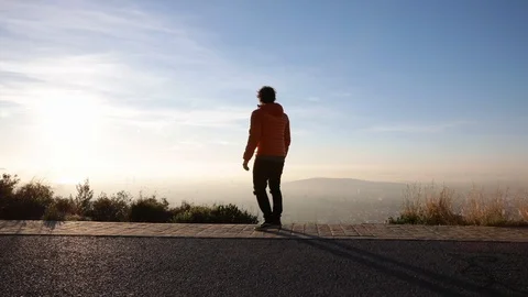 Man jumping at sunrise Stock Footage 104123614