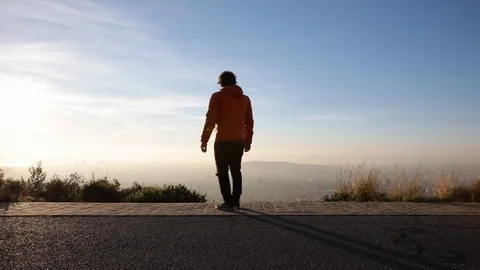 Man jumping at sunrise Stock Footage 104123616