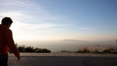 Man jumping at sunrise Stock Footage 104123624