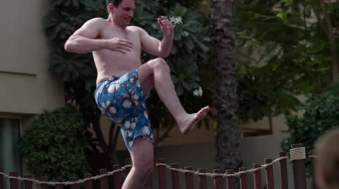 Man jumping in swimming pool. Stock Footage 64105018