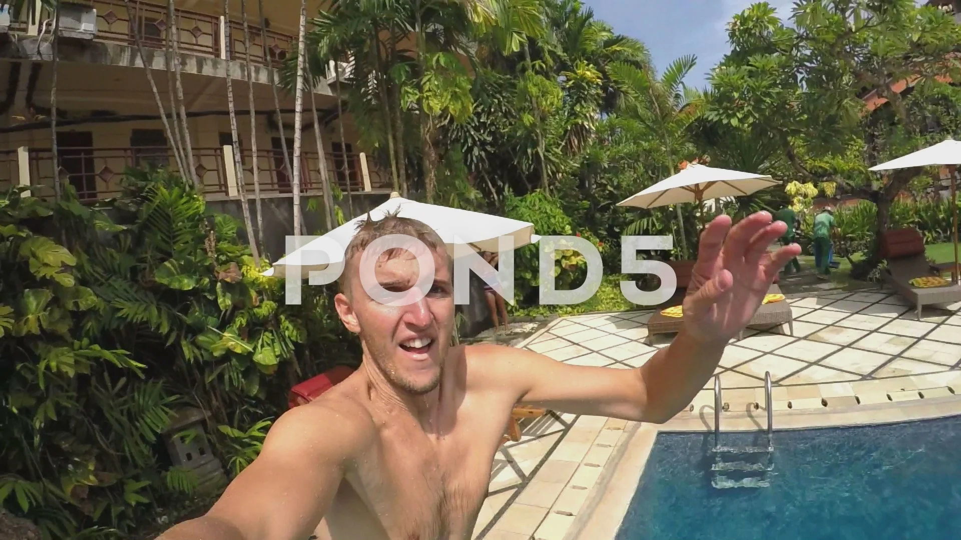 Man Jumping In Swimming Pool With Gopro Stock Video Pond5