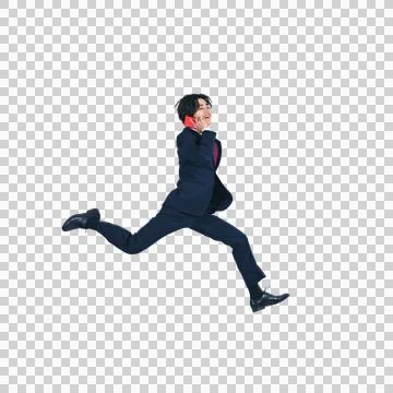 A man jumping while calling with a smartphone. Foto stock
