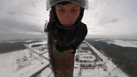 A man jumps from a 150-meter Stock Footage 195558442