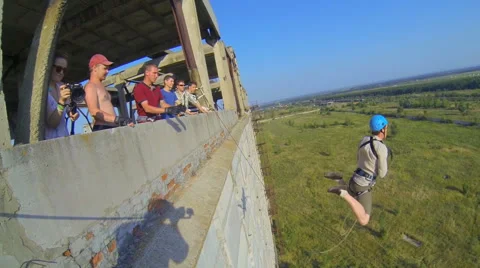 Man jumps forward, compressing the legs Stock Footage 41428889