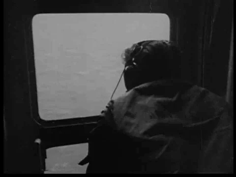 A man jumps from a ledge in an attempt to commit suicide in 1964. Stock Footage 75325109