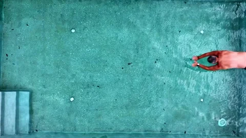 The man jumps in the pool from right. Stock Footage 213612267