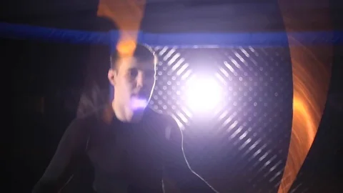 Man jumps on a skipping rope in a cage for MMA Stock Footage 71651879