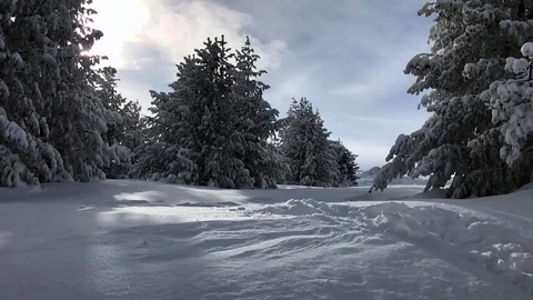 Man jumps in the snow Stock Footage 72964844