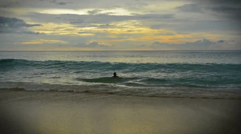 Man jumps on a wave in the surf Video stock 33294038