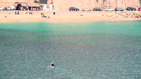 Man in kayak rowing Stock Footage 49073561