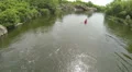 Man kayaker on quiet river .Rafting team, aerial. HD Footage