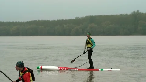 Man kayaking down the river while the second is preparing Video stock 110296647