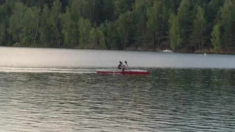 A man is kayaking on the lake Stock-Footage 247338499
